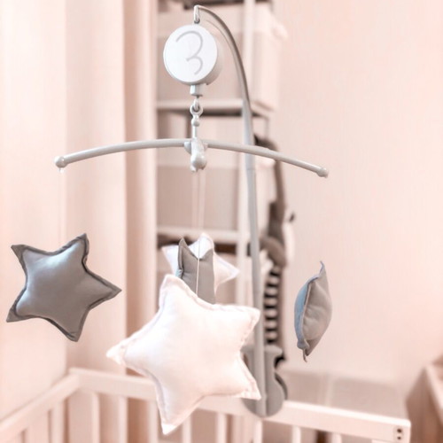 Baby mobile with stars like new, wind-up with music