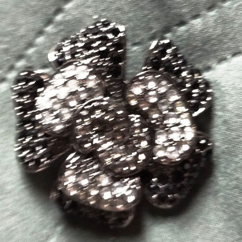Vintage brooch with black and silver rhinestones, flower shape, like new
