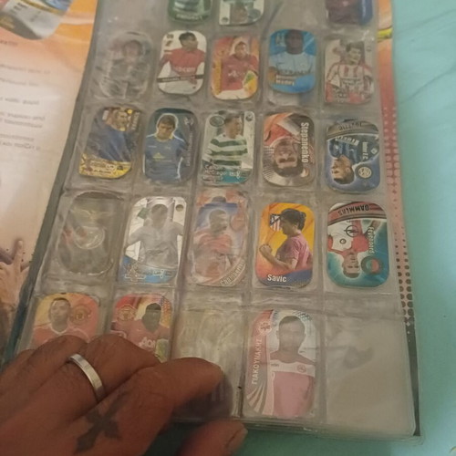 Panini metal tags album like new, contains about 80 metallics