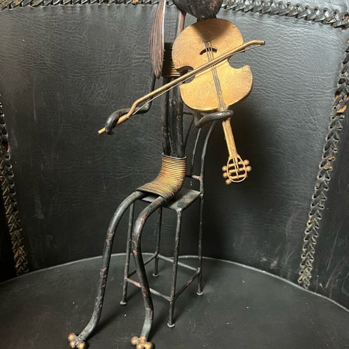 Abstract metal art cello player used
