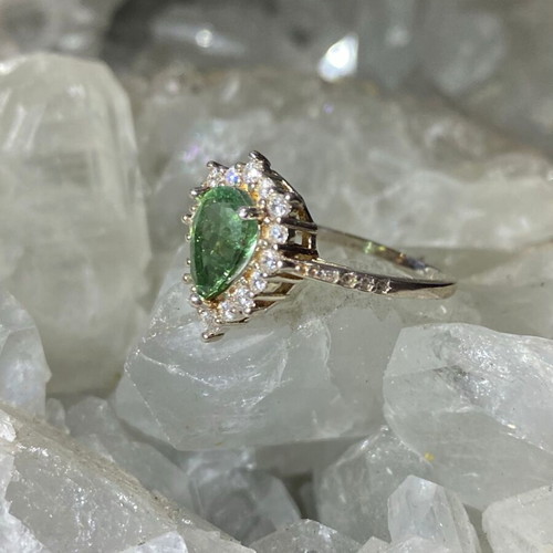 Silver ring with natural green tourmaline and moissanite