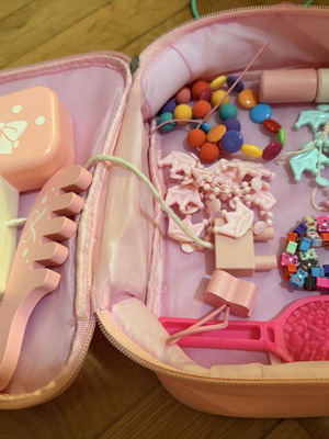 Wooden Beauty Kit in Pink Toiletry Bag used