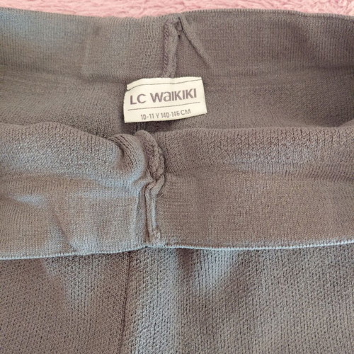 Knitted leggings used for girls age 10, charcoal with designs