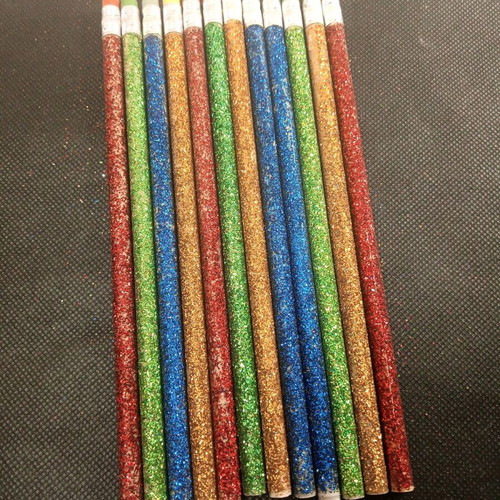 Pencils new with glitter and eraser on the back