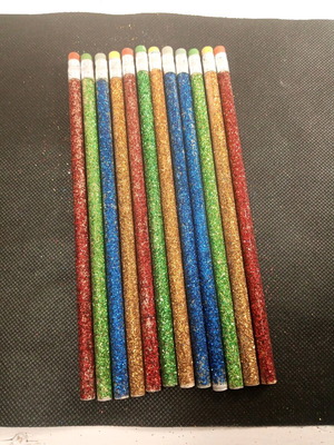Pencils new with glitter and eraser on the back