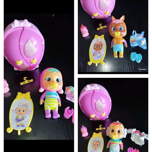 Crybabies dolls like new, set of 9 plus unicorn gift