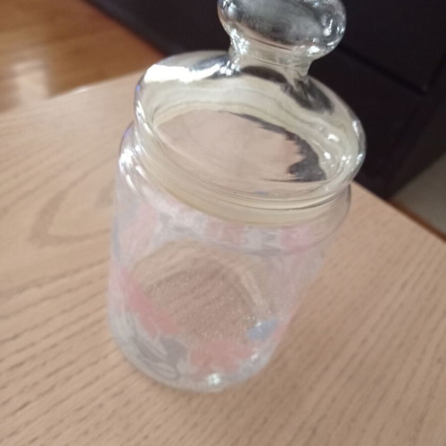 Glass kitchen jars like new, 1 small and 1 large