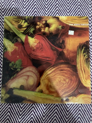 The Mock Turtles LP used with scratch and packaging wear