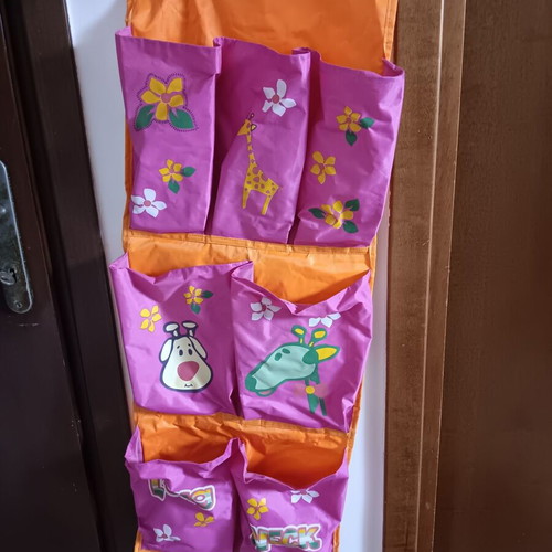 Children's storage pocket panel used
