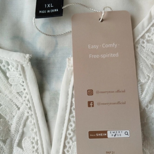 White sleeveless blouse new, romantic boho style with eyelet embroidery