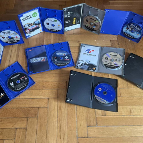PlayStation 2 Fat bundle like new with 9 games, memory card and SingStar mic