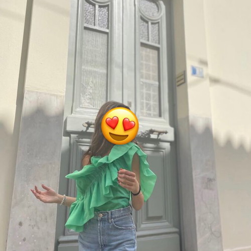 Green blouse with ruffles