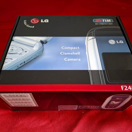 LG F2400 mobile phone packaging like new with charger and manual