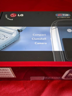LG F2400 mobile phone packaging like new with charger and manual