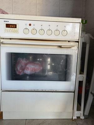 Oven used with four burners