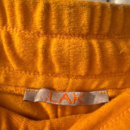 Orange Lak terry tracksuit by Lakis Gavalas