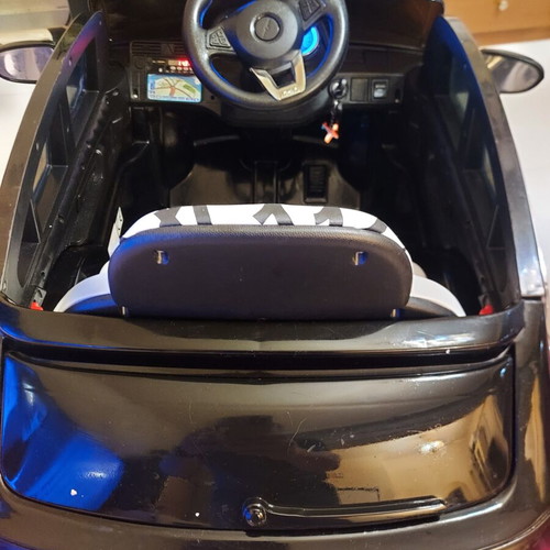 BMW X6 electric ride-on car like new with remote control and LED lights