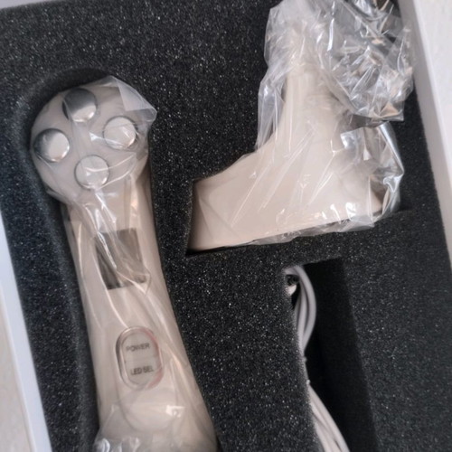 Ultrasonic anti-aging device new with phototherapy