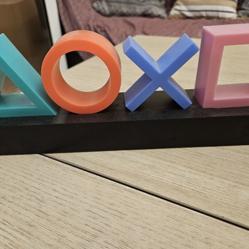 PlayStation Icons Lamp like new with colored symbols on black base