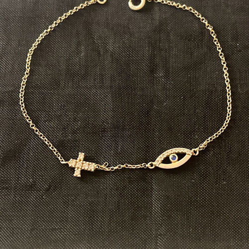 Silver delicate bracelet with cross and eye like new