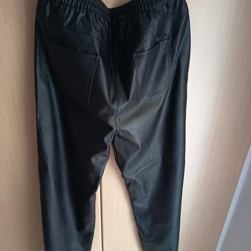 Black faux leather pants with button and elastic waist, size 3
