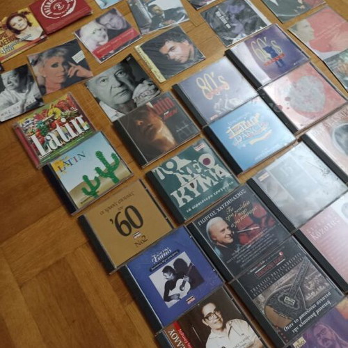 43 assorted DVDs with songs and movies