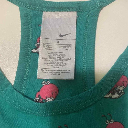 Nike athletic shirt used, size Medium, pink and green