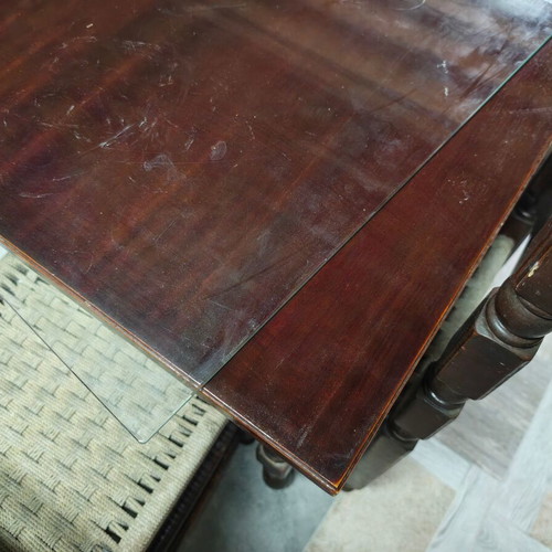 Wooden dining table with 4 chairs and glass top