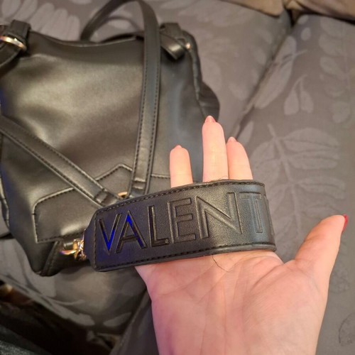 Valentino backpack used, black with gold clasp