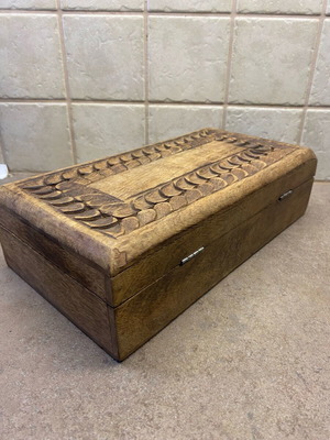 Vintage wooden box used with carvings