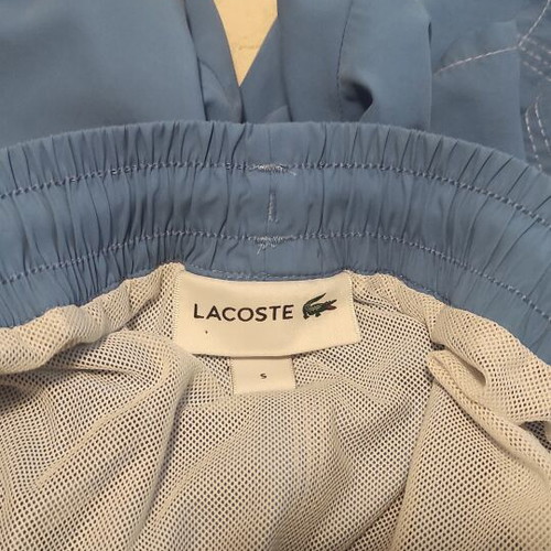 Lacoste shorts used, size S, blue with stains
