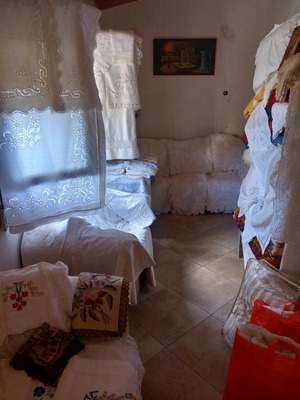 Dowry with handmade embroidered linens and fabric sets