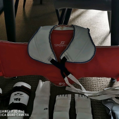 Tae Kwon do equipment used with medium chest protector and small accessories