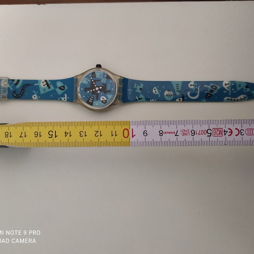Swatch Vintage 1995 Swiss Musical Faces Running Man Unisex Watch like new