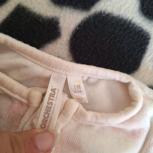 Velour newborn bodysuit used with zipper