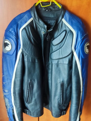 Bering leather motorcycle jacket used with scratches and hole