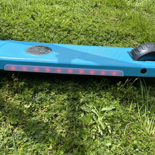 Electric children's scooter used with charger