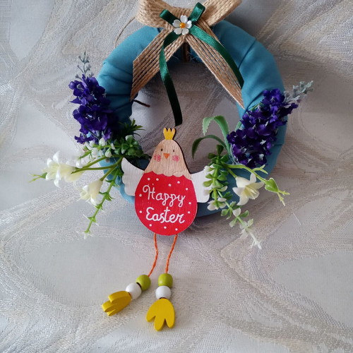 Small May wreath used with wildflowers and wooden chicken
