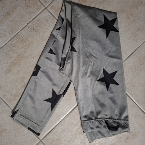 Hyper women's silver leggings with black stars, one size
