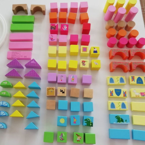 Wooden blocks toy used, 99 pieces in barrel