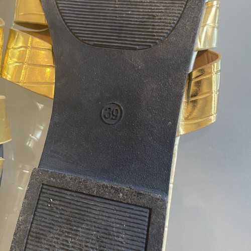 Gold Sandals like new, unique design, size 39