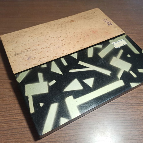 Wooden stationery box with used pencils and ink cartridges set