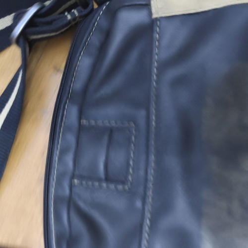 Nike shoulder bag used, black and gold with logo imperfections