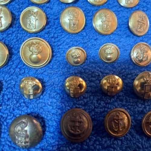 Collection of used antique and vintage brass uniform buttons