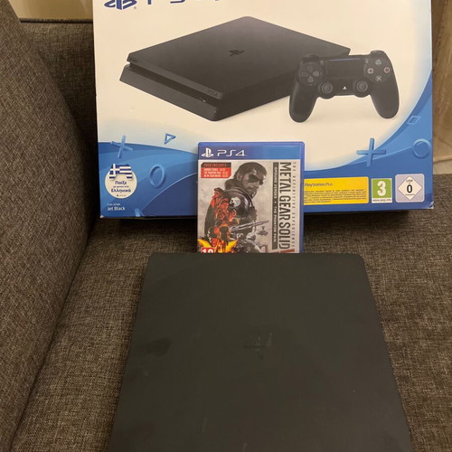 PS4 Slim 500GB console like new with controller and Metal Gear Solid
