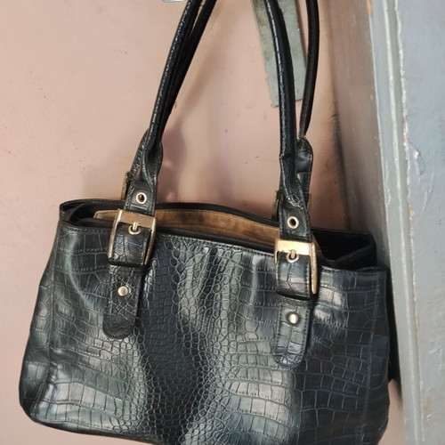 Vintage black women's shoulder bag with crocodile and snake texture, used