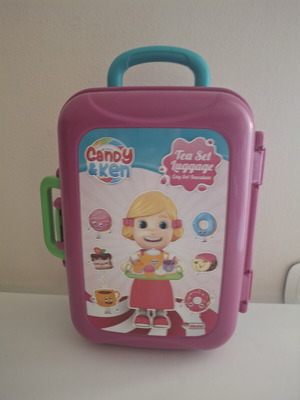 Toy Kitchen Set like new with tea set luggage and utensils