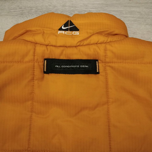Nike ACG Retro Puffer Vest used, orange and black, size S