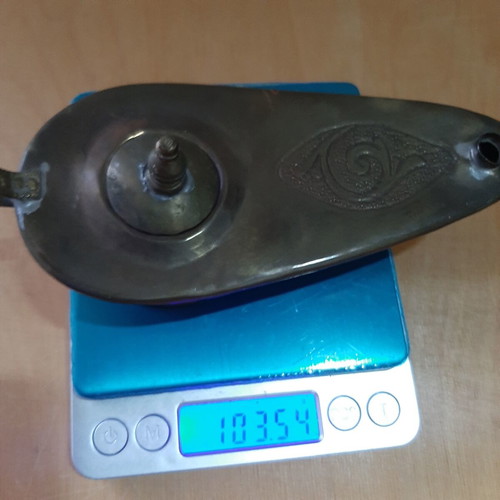 Copper oil lamp used with carved decorations and patina