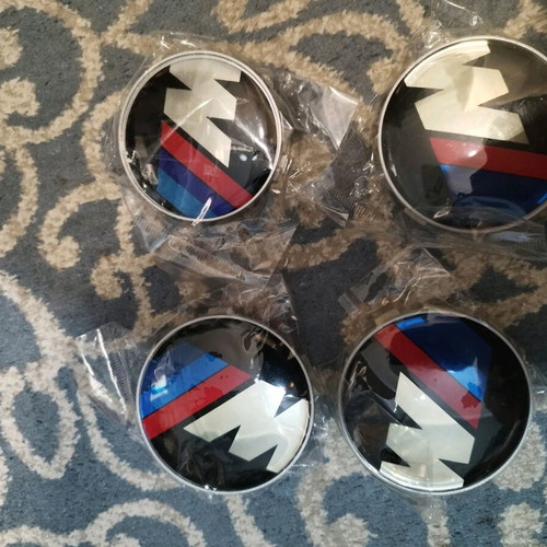 Caps for BMW rims new, one smaller due to wrong order